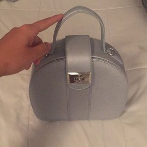 A snob essential handbag